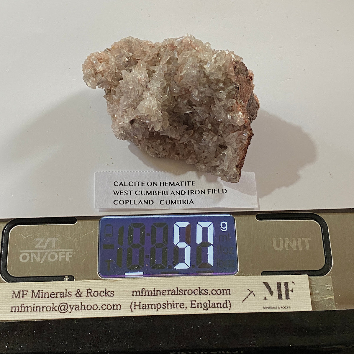 CALCITE ON HEMATITE : WEST CUMBERLAND IRON FIELD, COPELAND, CUMBRIA. 57g MF5354