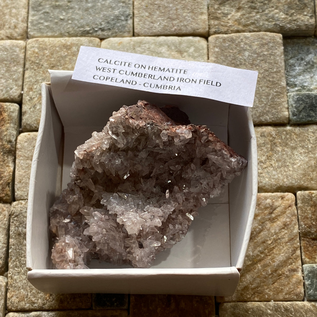 CALCITE ON HEMATITE : WEST CUMBERLAND IRON FIELD, COPELAND, CUMBRIA. 57g MF5354