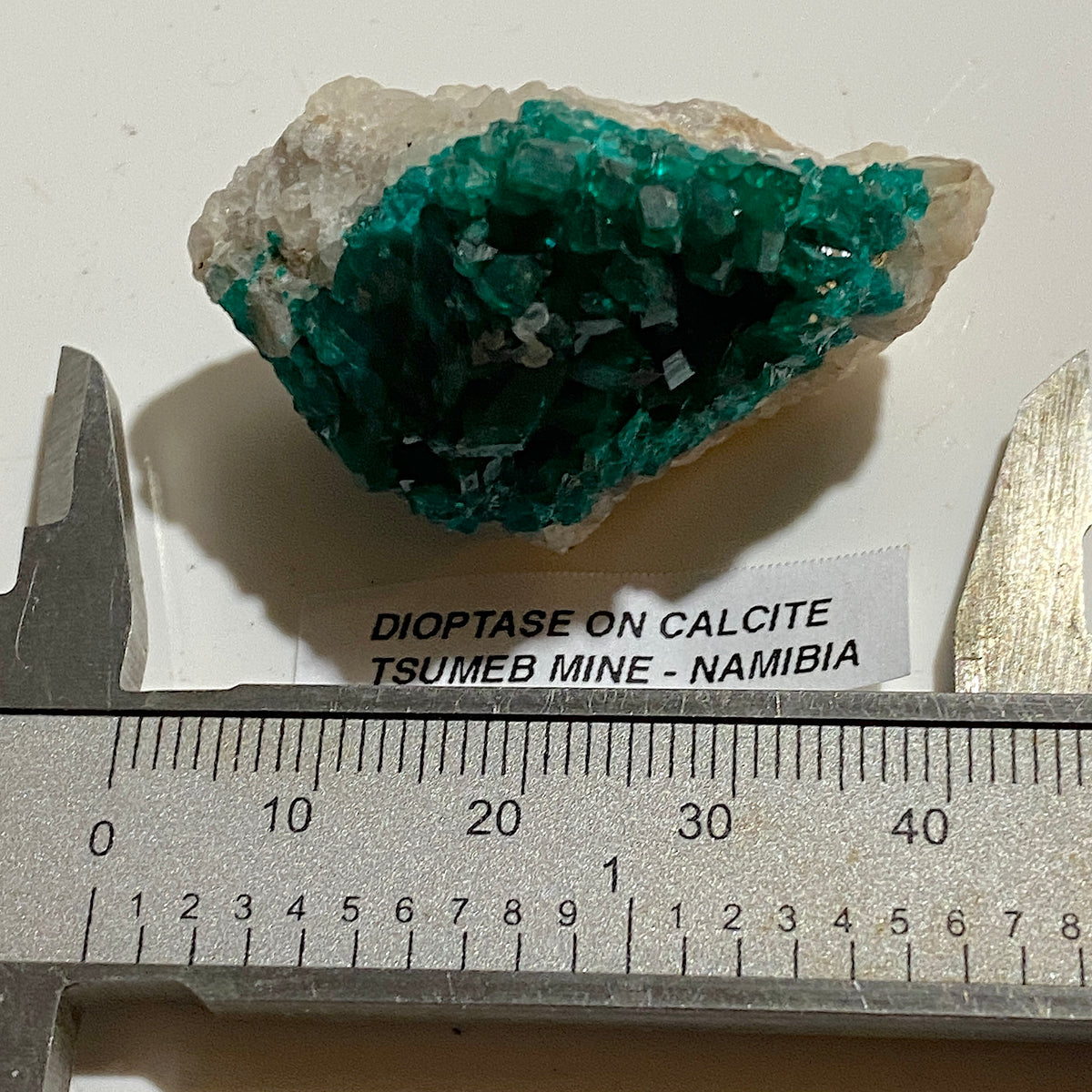 DIOPTASE ON CALCITE : TSUMEB MINE, OSHIKOTO, NAMIBIA. 22g. MF5357