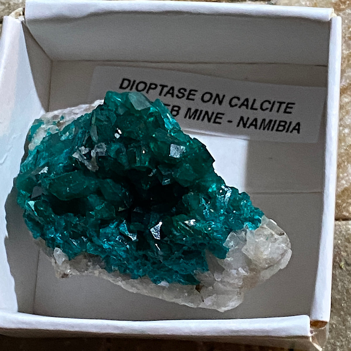 DIOPTASE ON CALCITE : TSUMEB MINE, OSHIKOTO, NAMIBIA. 22g. MF5357