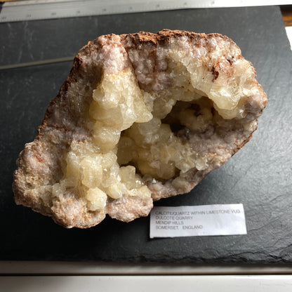 LIMESTONE VUG WITH CALCITE/QUARTZ, DULCOTE, SOMERSET HEAVY 990g MF1491