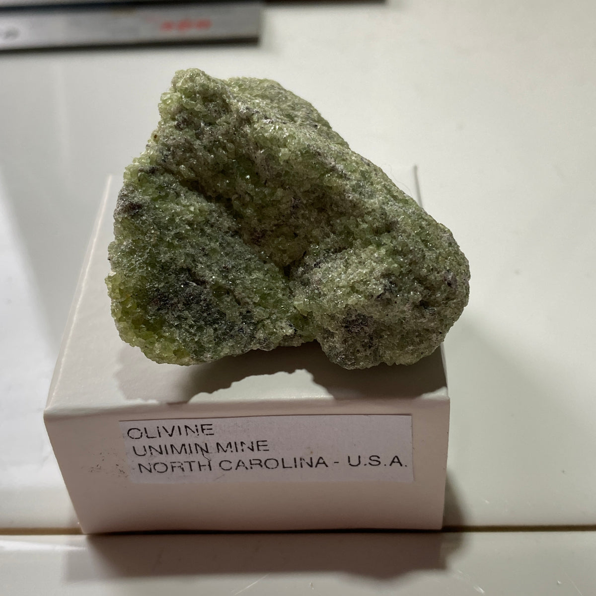 OLIVINE : UNIMIN MINE, YANCY COUNTY, NORTH CAROLINA, U.S.A.  47g. MF5390