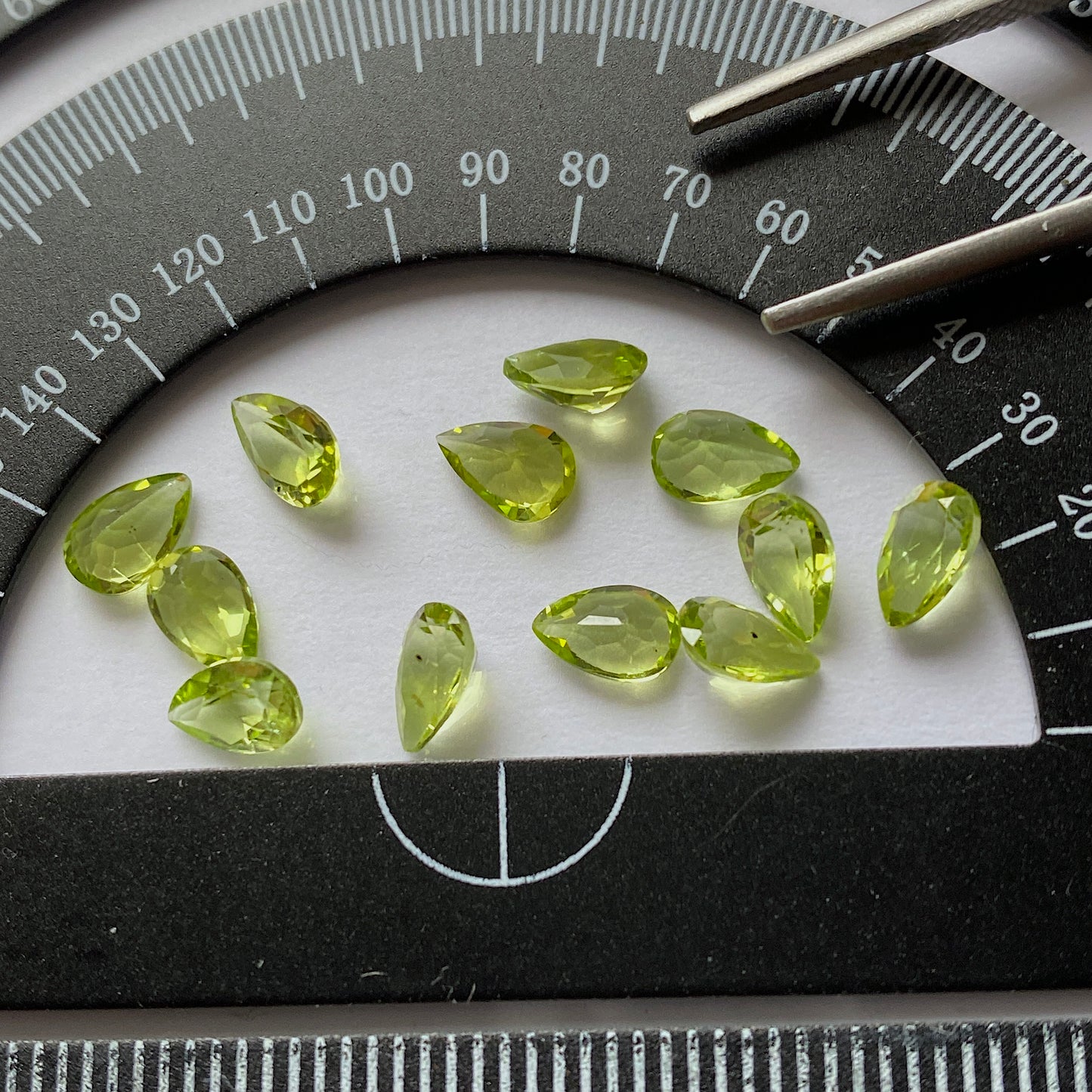 PERIDOT NATURAL GEMSTONES x 12 - SKARDU, GILGIT-BALTISTAN, PAKISTAN. 5.24Ct MFG3565