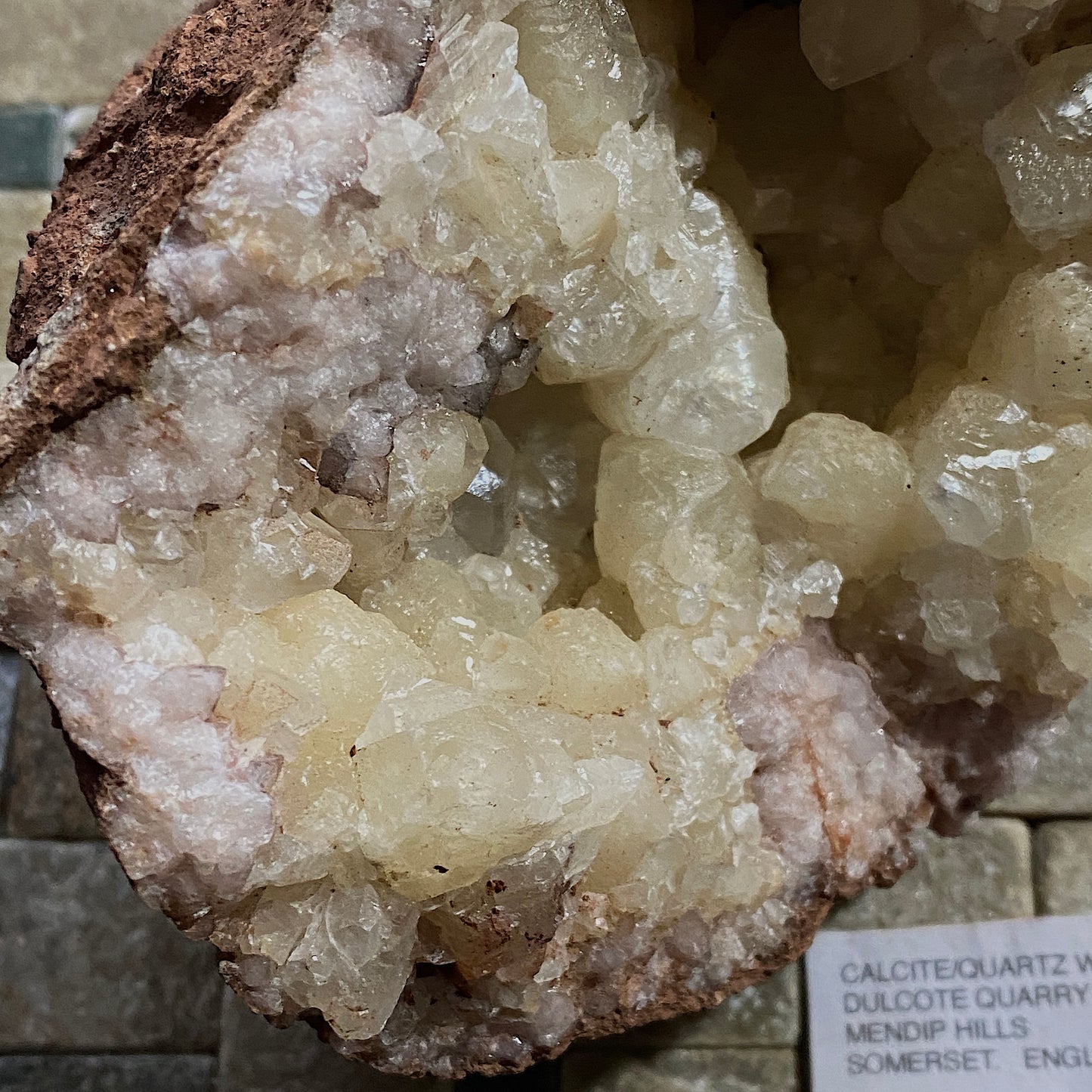 LIMESTONE VUG WITH CALCITE/QUARTZ, DULCOTE, SOMERSET HEAVY 990g MF1491