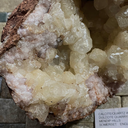 LIMESTONE VUG WITH CALCITE/QUARTZ, DULCOTE, SOMERSET HEAVY 990g MF1491