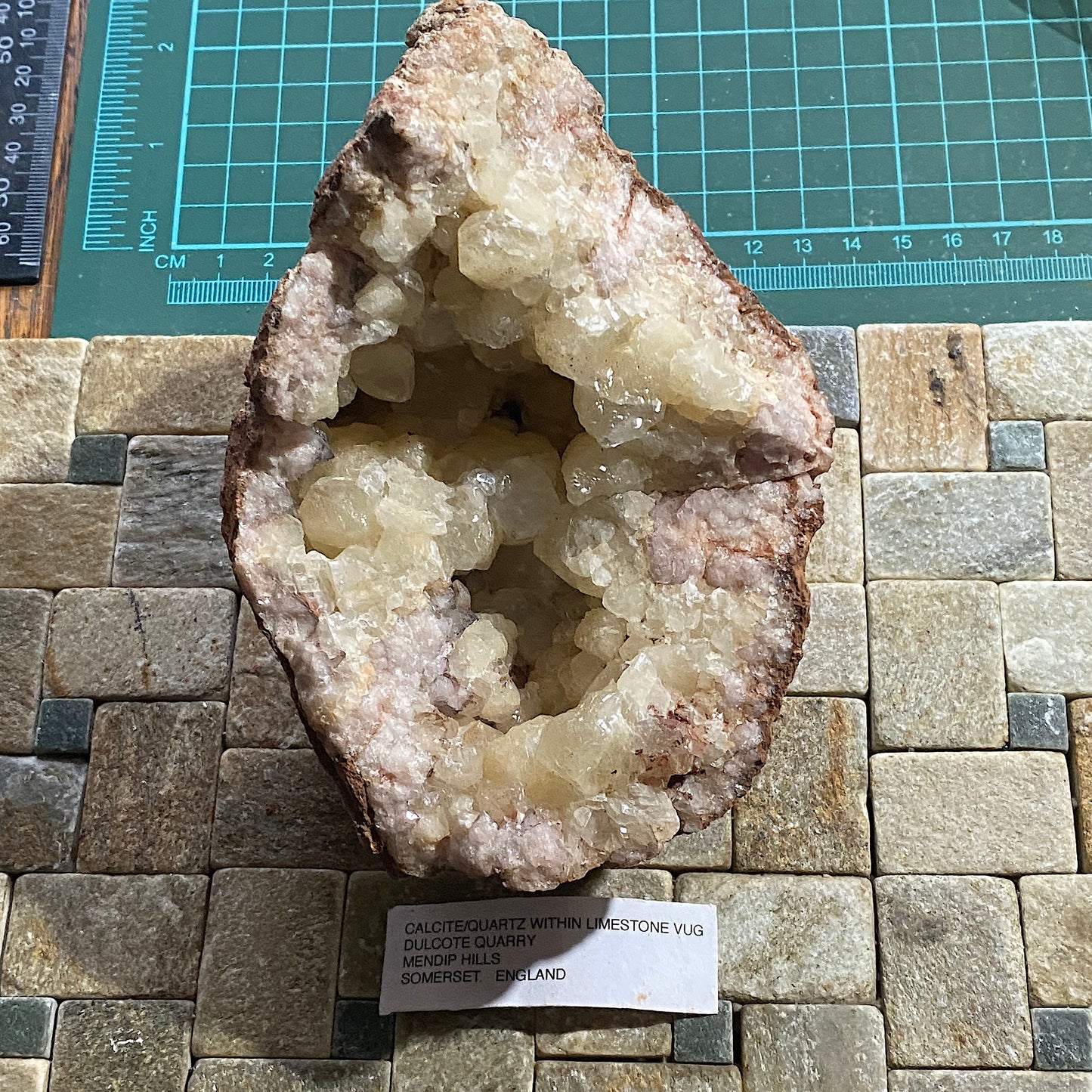 LIMESTONE VUG WITH CALCITE/QUARTZ, DULCOTE, SOMERSET HEAVY 990g MF1491
