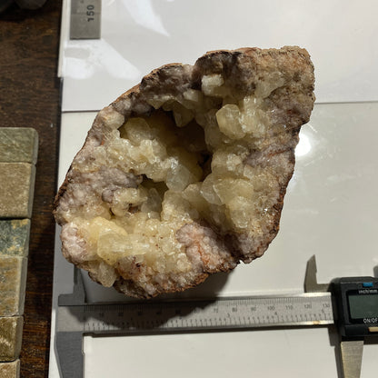 LIMESTONE VUG WITH CALCITE/QUARTZ, DULCOTE, SOMERSET HEAVY 990g MF1491
