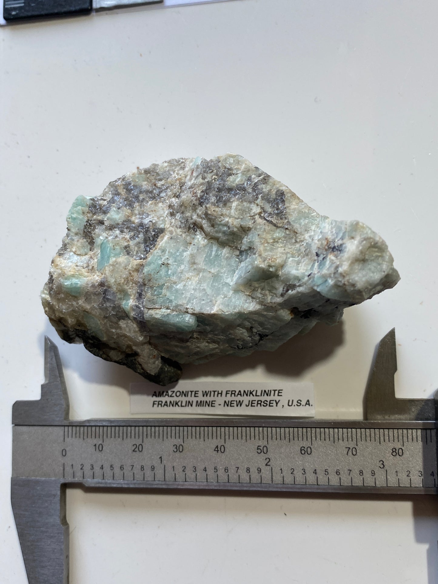AMAZONITE WITH FRANKLINITE : FRANKLIN MINE, SUSSEX COUNTY, NEW JERSEY, U.S.A. 128g. MF5109