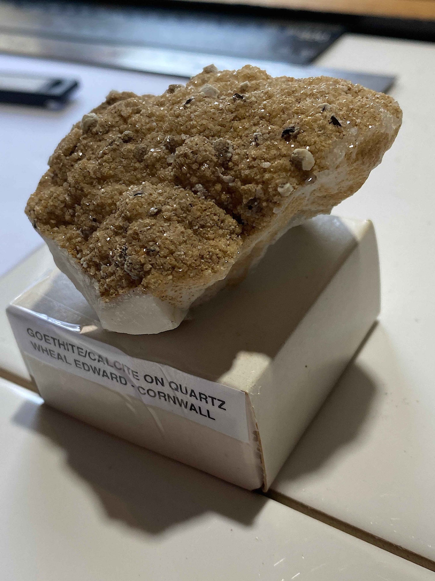 GOLDEN GOETHITE WITH CALCITE ON QUARTZ : WHEAL EDWARD, CORNWALL. 126g. MF5110
